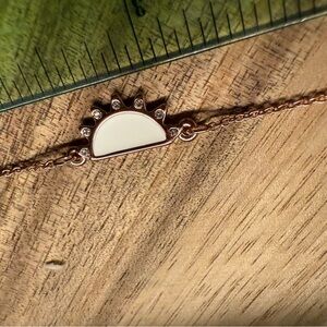 Elegant Cream and Gold Sunburst Bracelet